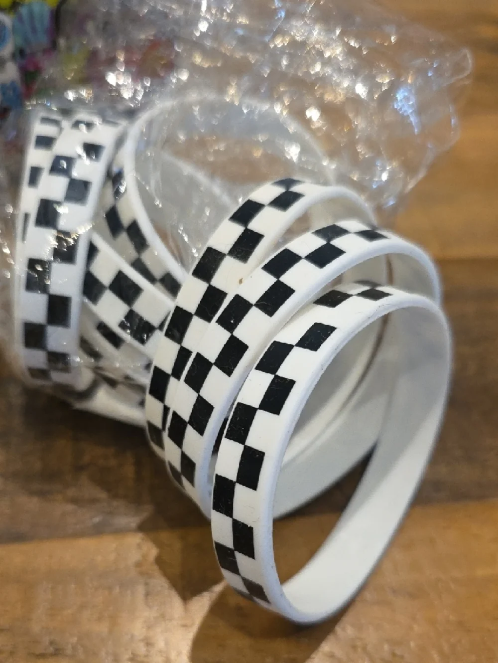 Checkered Skateboard Party Sunglasses & Wristband Party Favor Bundle